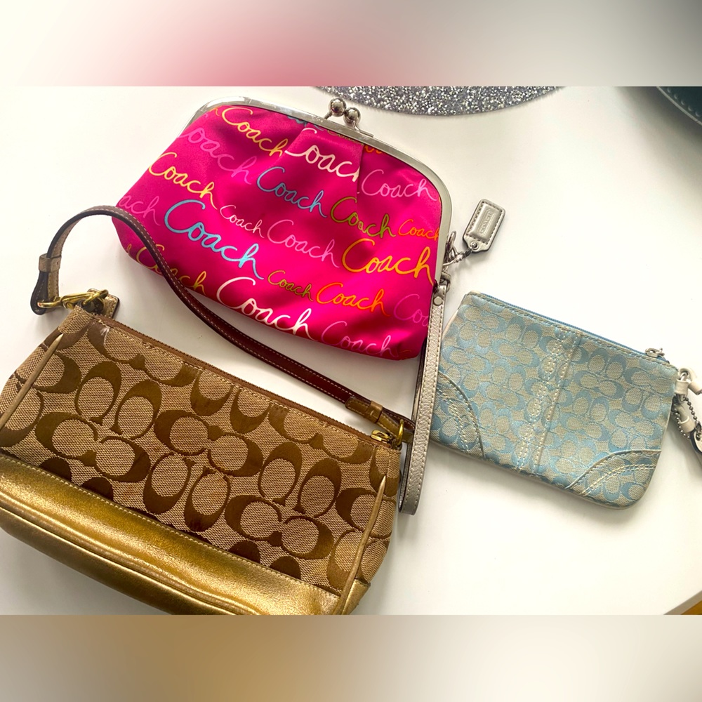 1 small Coach bag, 1 clutch, and 1 wristlet